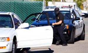 Richmond police officer Michael Brown, right, and detective Mauricio Canelo participate in a car stop exercise where Brown and Canelo, as the civilian